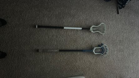 2 lacrosse faceoff sticks