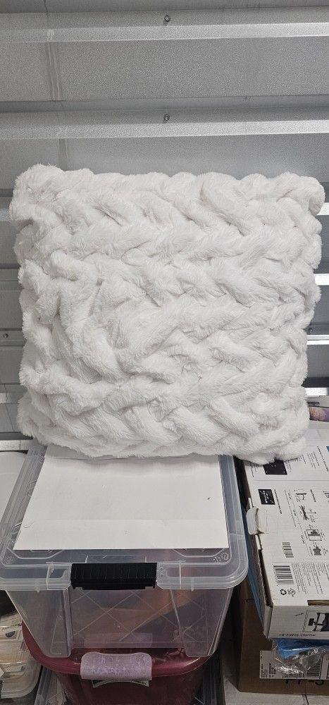 2 soft pillows and a blanket