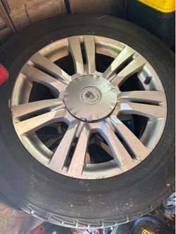 2014 Cadillac srx OEM rims and tire 235/65/18