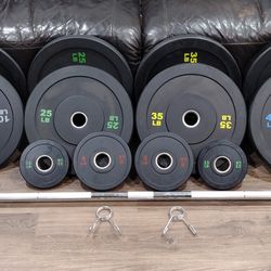 
   OLYMPIC  BARBELL BAR  7ft.
 45lb. AND OLYMPIC BUMPER
  WEIGHT  PLATES.