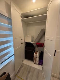Large Open White Ikea Closet