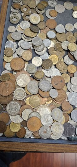 1000's of US and World Coins Reduced to Fifty cents each