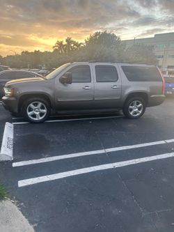 2011 Chevy Suburban 1500 Sport Utility 4 Door Sedan