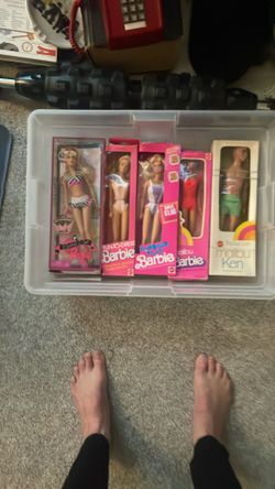 Barbie and a Ken Doll. ( Take All )