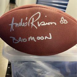 Authentic football signed by Andre “Bad Moon” Rison