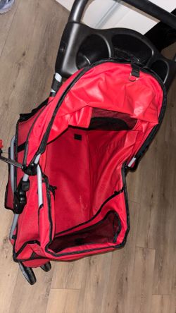 It’s a dog stroller