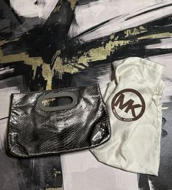 MICHAEL Michael Kors Berkley clutch in python-embossed metallic grey leather with silver-tone hardware.