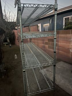 Stock rack hig 72” long 72” wide 18” ask $60