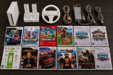 $290 - Used Nintendo Wii RVL-001 console with 12 games