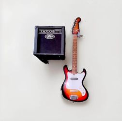 Vintage 1960s Tele-Star electric guitar with a Jasmine S35 Dreadnought Acoustic Guitar Natural Finish. Comes with Peavey Backstage 26W Amp 1 Speaker.