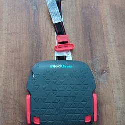 Mifold One The Non-Folding Grab-and-Go Booster Compact Storable