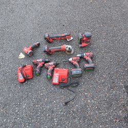 7 Miluakee Cordless Tools And 2 Chargers ,All Withbatteries