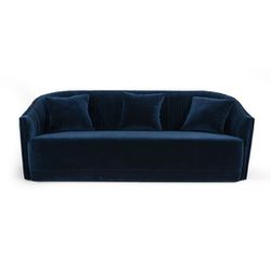 Modern Blue Velvet & Brass Sofa exudes elegance and comfort. Upholstered in luxurious blue velvet, it features exquisite antique brass nailhead trim t