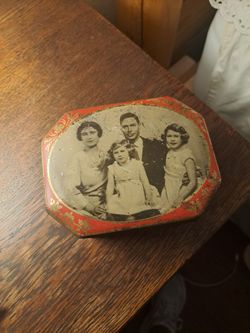 Antique  candy tin.