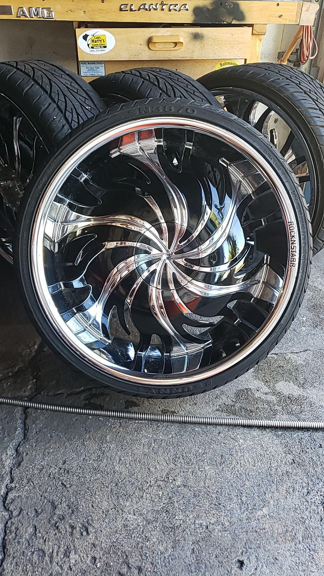 22" Rocknstarr wheels and tires chrome and black Kia bolt pattern 4.5 or114. 3mm