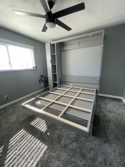 Modern gray Murphy bed system includes a queen-size wall bed frame-Used good