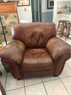 Leather chairs and ottomans