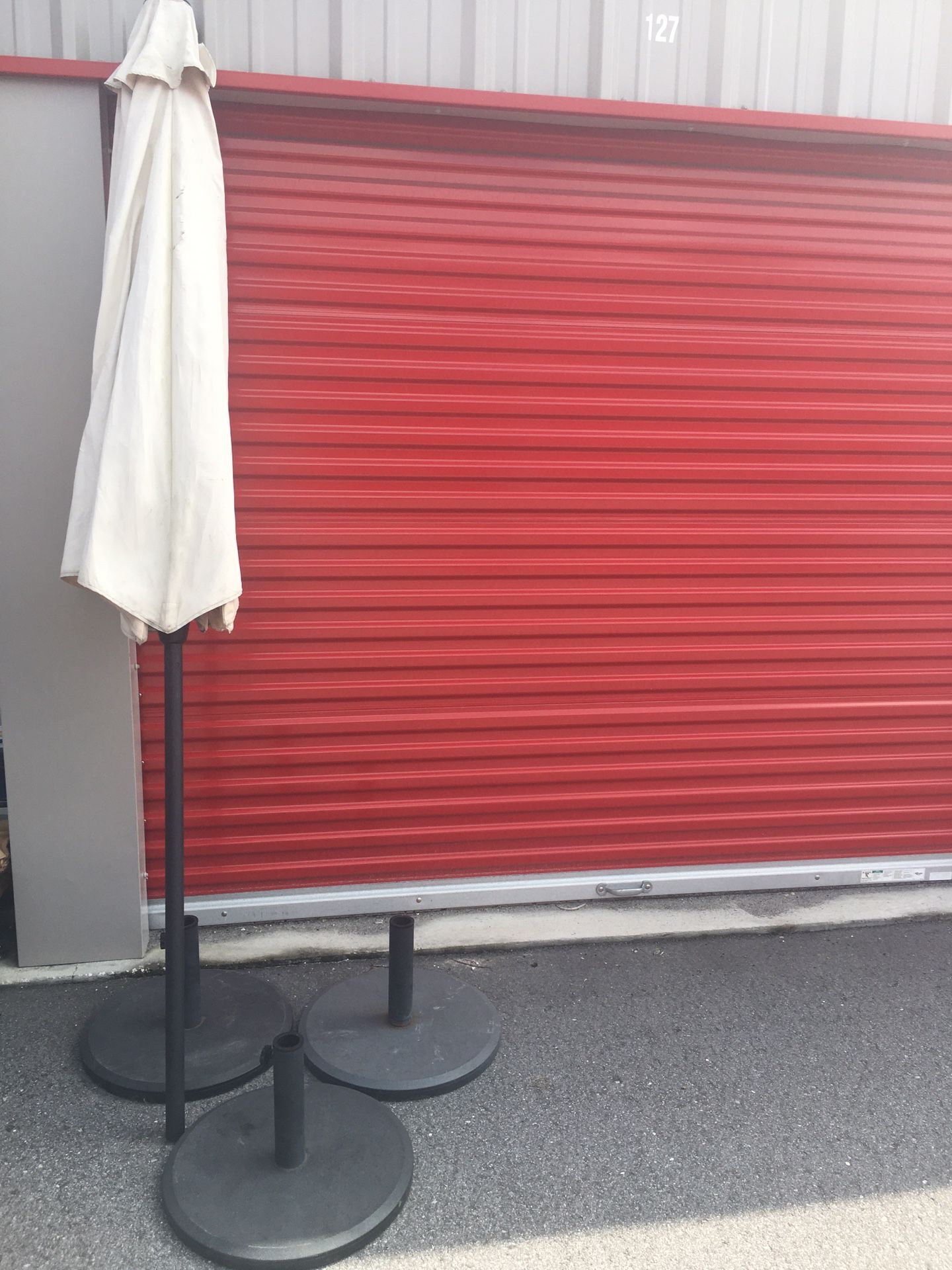 3 Heavy Patio Umbrella Base- 3 Used Umbrellas