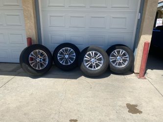 Ford f150 rims and tire 18’