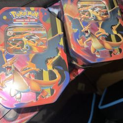 Charizard Y tins