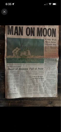 Man on the moon newspaper