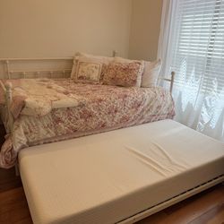 Full Bed With A Slide Out Twin Bed. 