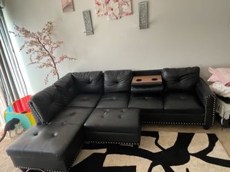 Black with sliver accent left facing L shaped sectional