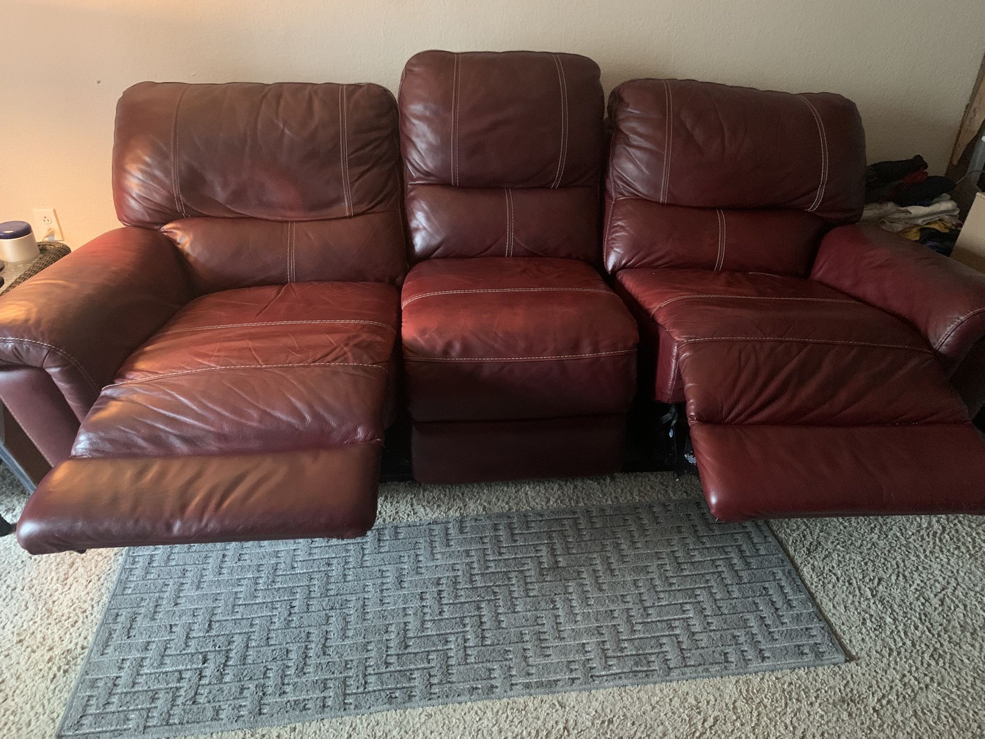 Free Red Leather Reclining Couch.