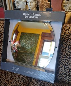 TILT WALL MIRROR, OVAL, BEVELLED.  BRAND NEW IN ORIGL BOX