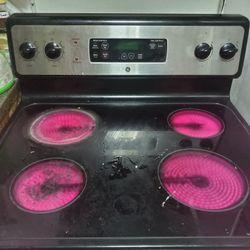 electric stove great condition warranty $350..
