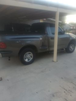 Blue 2003 Ford xl