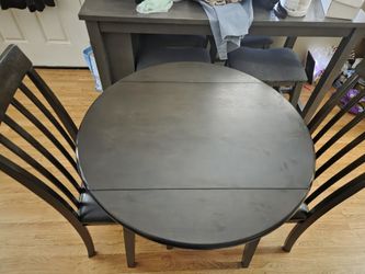 Round Table With Foldable Sides. Dark Brown