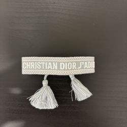 Light gray Christian Dior J'Adore tassel cotton woven friendship bracelet