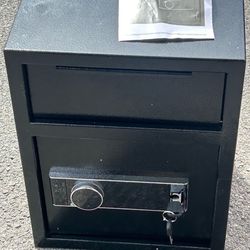 Brand new heavy duty drop safe with key for $90