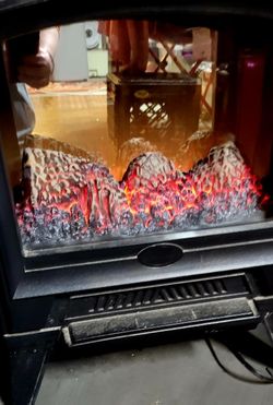 Older Fake Fireplace Heater