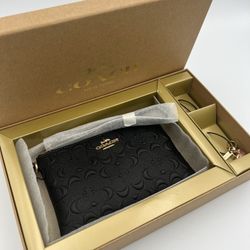 Coach Boxed Embossed Wristlet With Charms 