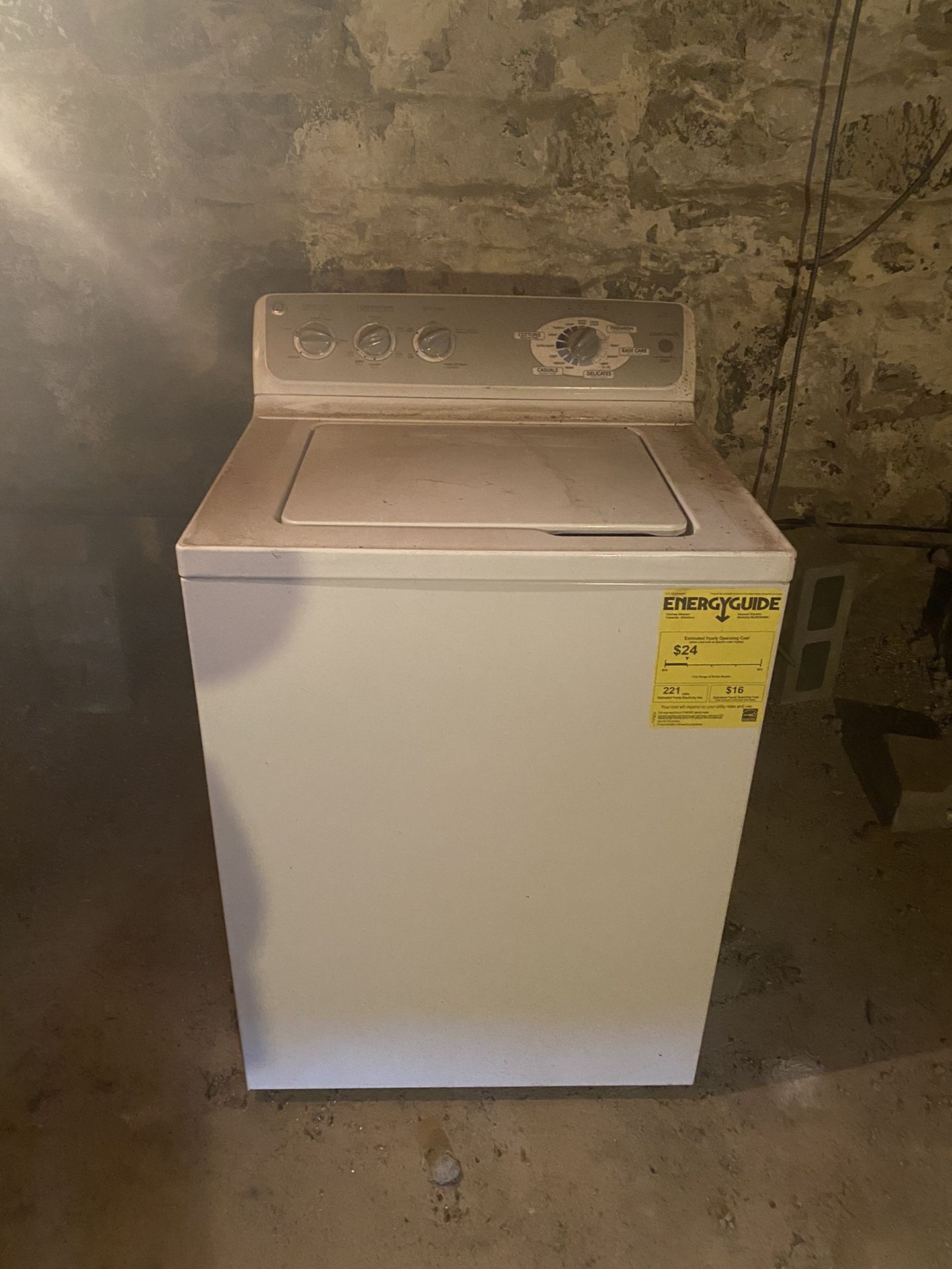 GE electric washing machine never been used. BRAND NEW