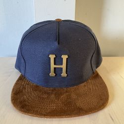 Huf Navy and Brown SnapBack. Beautiful details with canvas body and suede bill.