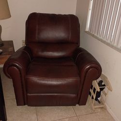 Beautiful deep brown leather recliner chair