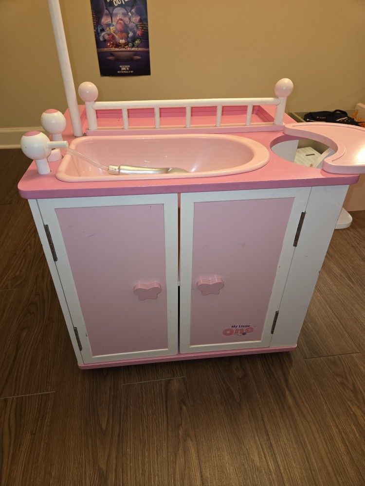 Wooden doll changing station