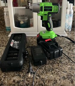Cordless impact wrench kit with two batteries, charger and impact socket set