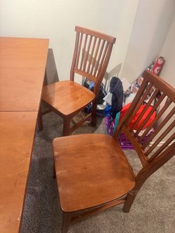 Extendable wooden dining room table set and four chairs