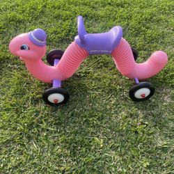 Pink Radio Flyer Wiggle Ride On Worm Toy