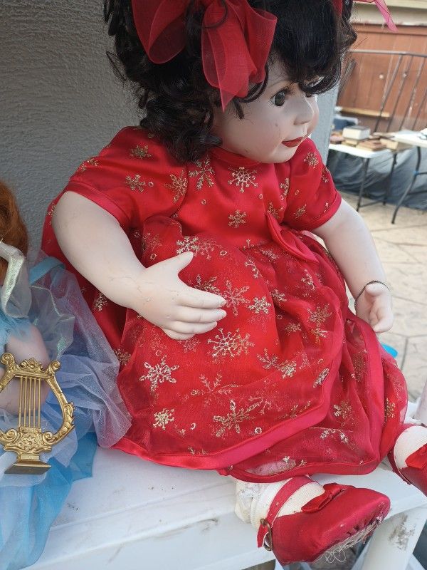 Lot Of 4 Porcelain Dolls