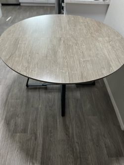51’ Modern round dining table.