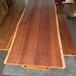 Solid cherry live edge dining room table with two benches