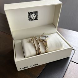 Anne Klein Women's Premium Crystal-Accented Gold-Tone Bangle Watch