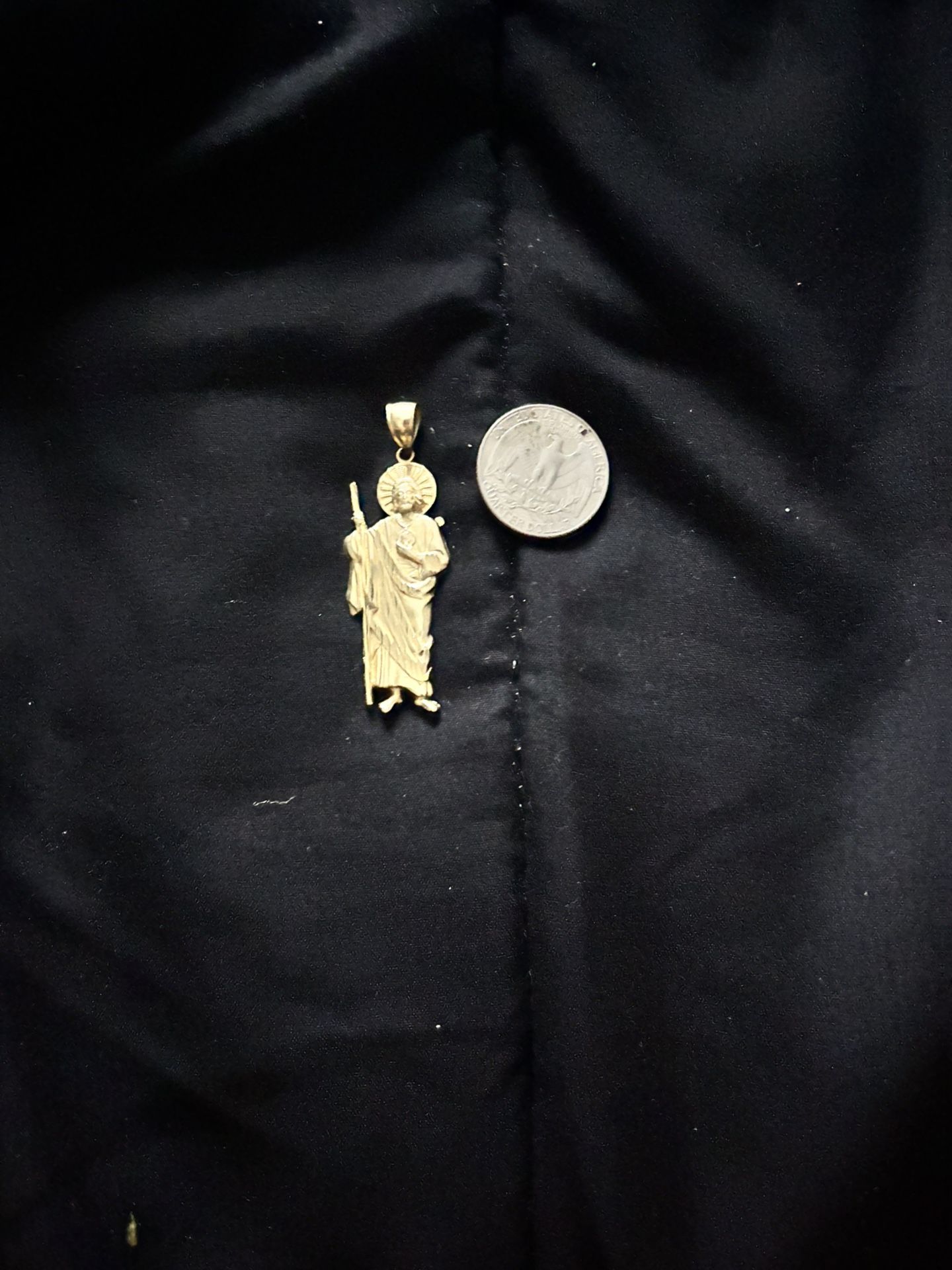 San Judas gold pendant