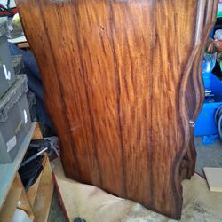 furniture is a vintage Italian-style serpentine Coffee Table