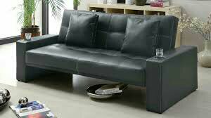 futon sofa with 2 accent pillows and cup holders